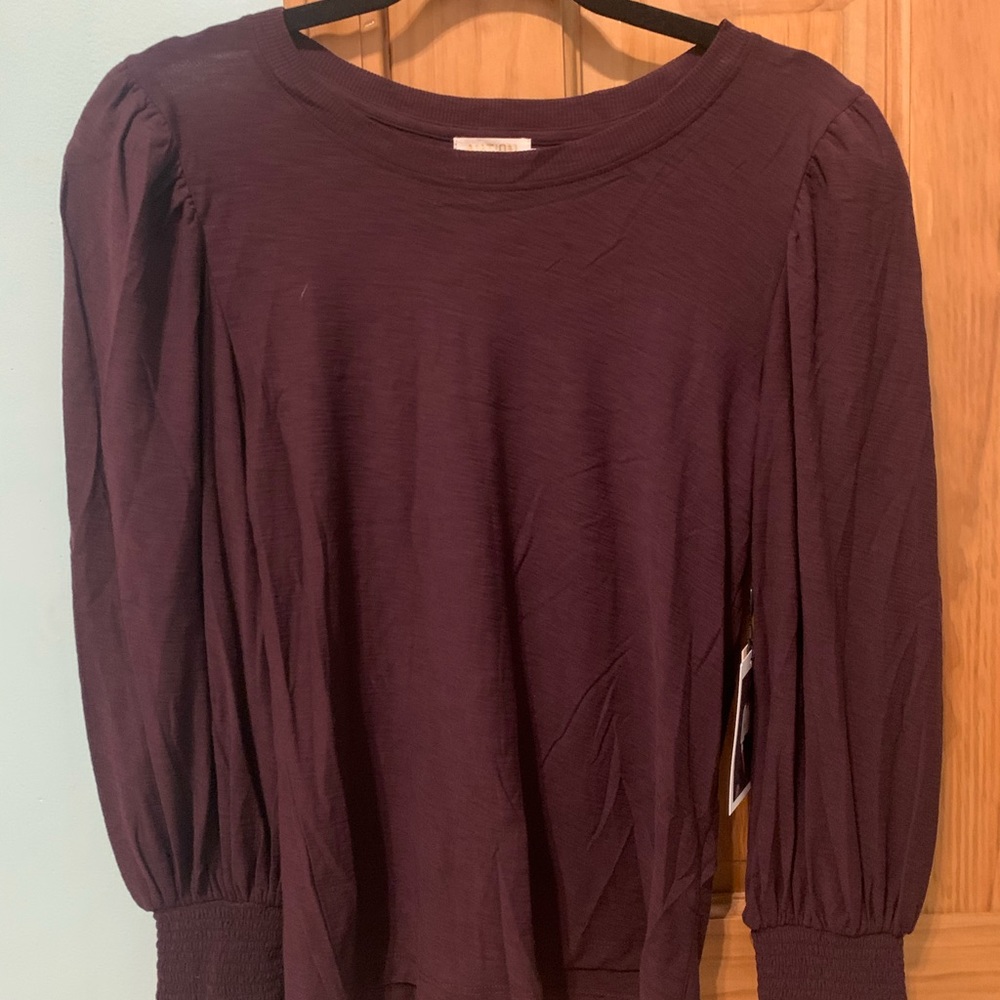 Very cute and in style shirt with tags on